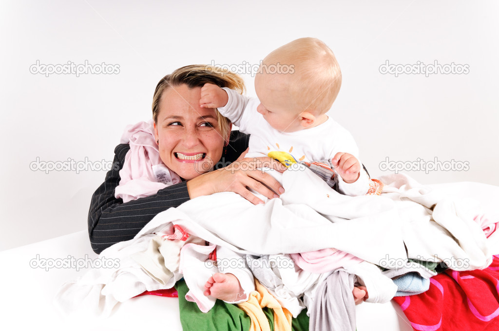 Mother and her son doing laundry