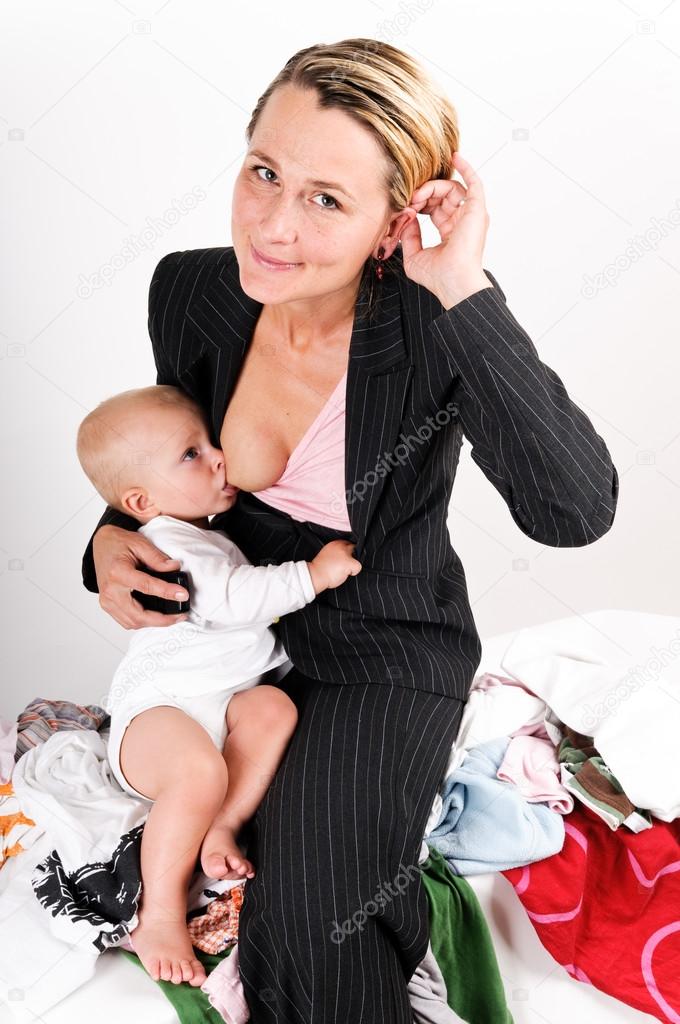 Happy mother breastfeeding her son