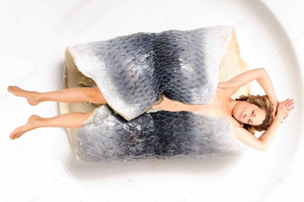 Woman wrapped in fish