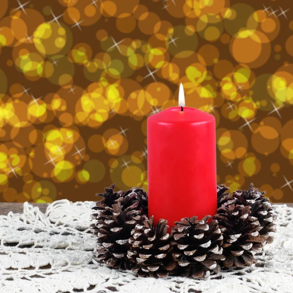 Зажженная красная свеча Стоковое Фото