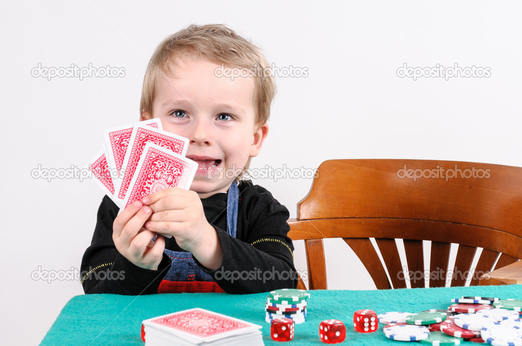 boy playing poker