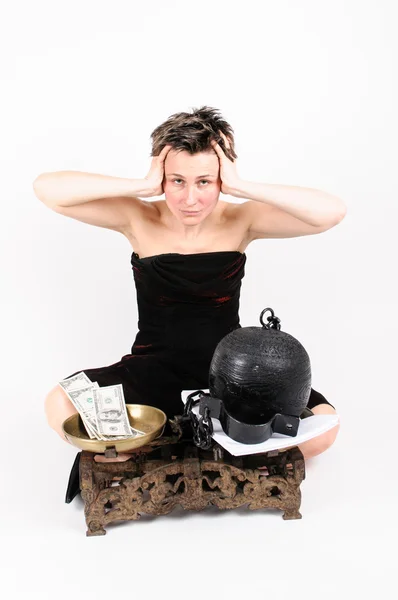 Woman with scales, money and prison ball — Stock Photo, Image