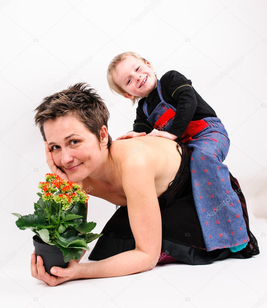 woman with a flower and her son