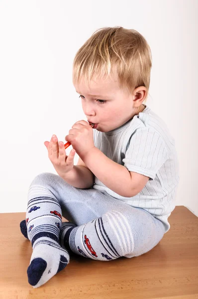 Boy with medicine — Stock Photo, Image