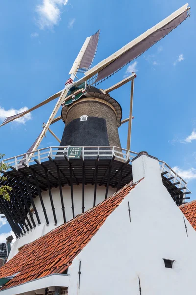 Side view of a Dutch Windmill Stock Photo