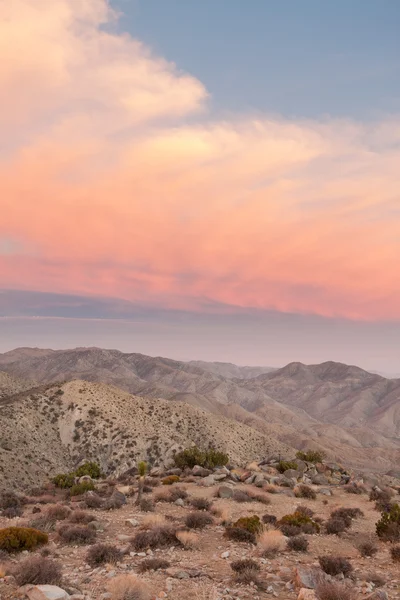 Desert Mountains with Pink Clouds Royalty Free Stock Images