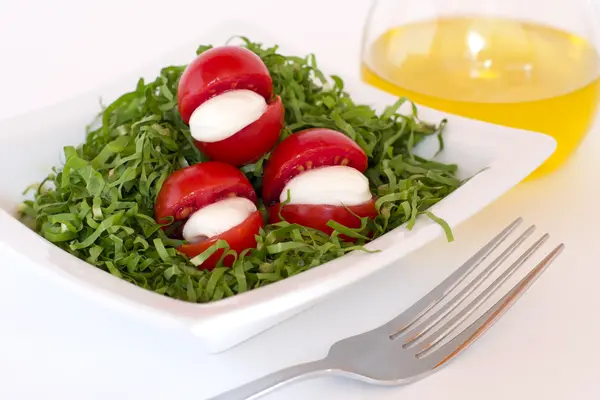 Tomato, green slad, oil and italian mozzarella — Stock Photo, Image