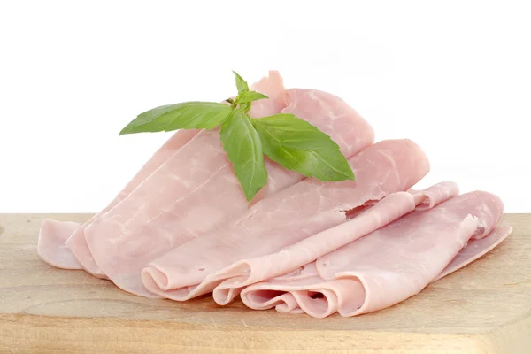 Baked ham with slices on wooden board — Stock Photo, Image