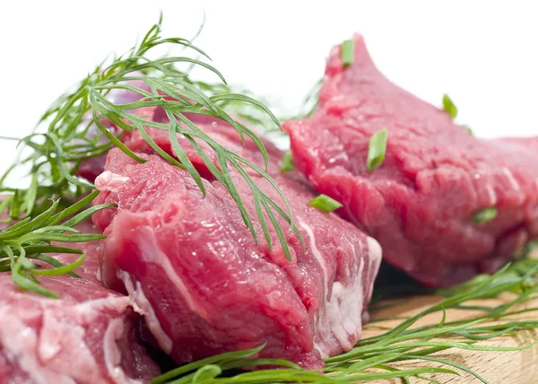 Carne crua com cebola chinesa verde close-up — Fotografia de Stock