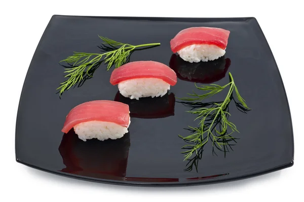 Sushi i svart plåt — Stockfoto