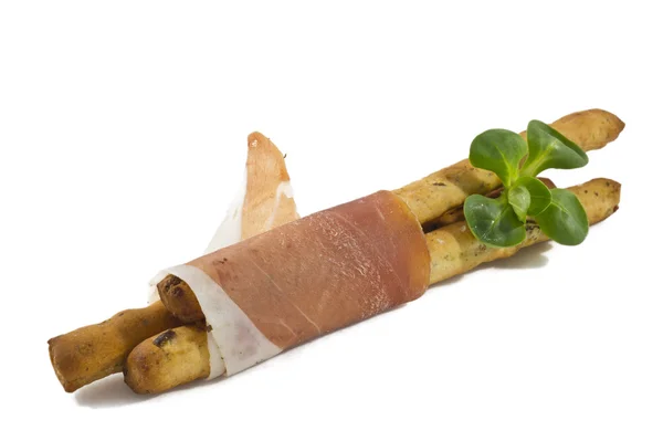 Italian prosciutto on a bread stick — Stock Photo, Image