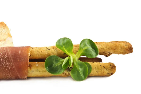Italian prosciutto on a bread stick — Stock Photo, Image