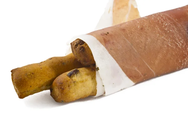 Italian prosciutto on a bread stick — Stock Photo, Image