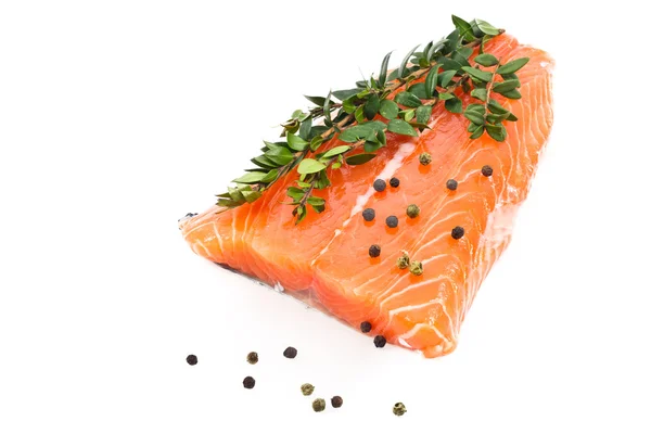 Fresh salmon fillet with pepper and herbs — Stock Photo, Image