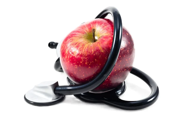 Jabłko dziennie odstrasza lekarza. — Zdjęcie stockowe