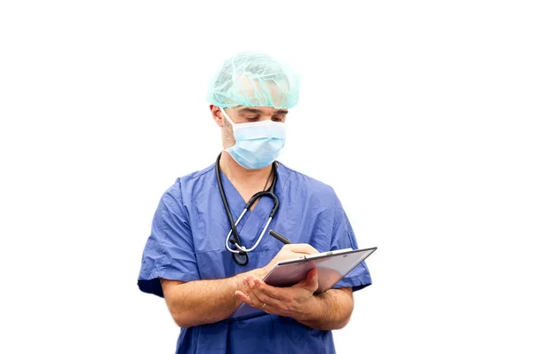 Nurse or doctor writing on clipboard — Stock Photo, Image