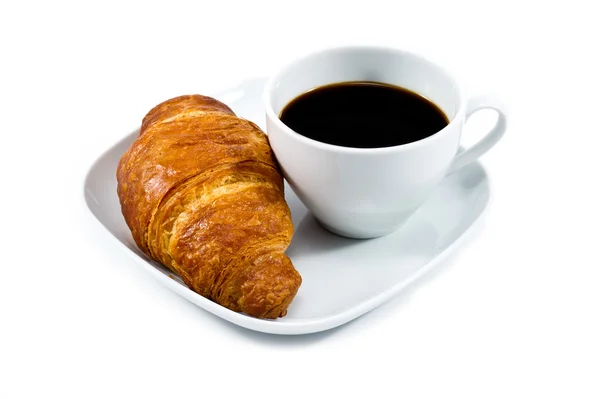 Colazione con tazza di caffè nero e croissant — Foto Stock