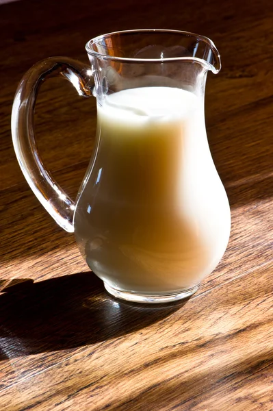Glass jug of milk — Stock Photo, Image