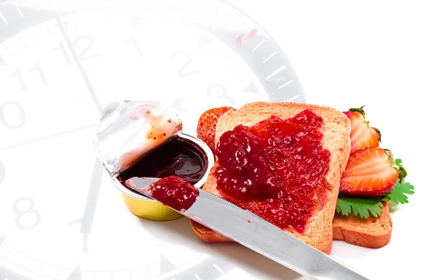 Breakfast time: crispbreads with strawberries jam — Stock Photo, Image