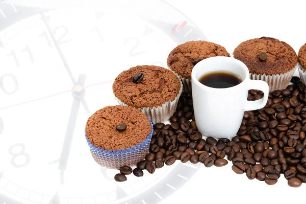 Coffee Muffins with a cup of coffee on clock's background — Stock Photo, Image