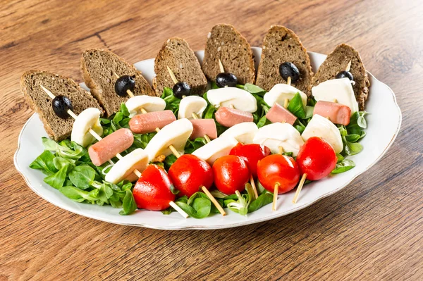 Fresh italian cheese and vegetables with bread — Stock Photo, Image