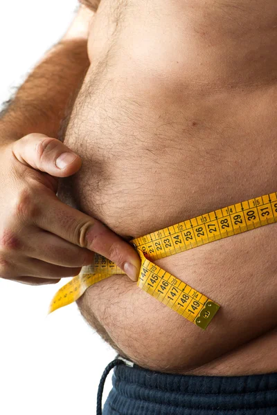 A man measuring his belly fat — Stock Photo, Image