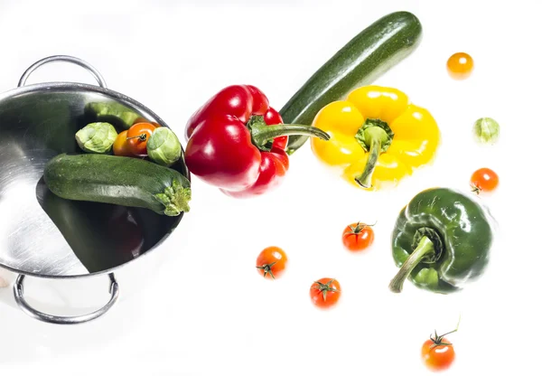 Mixed colorated peppers on white background — Stock Photo, Image