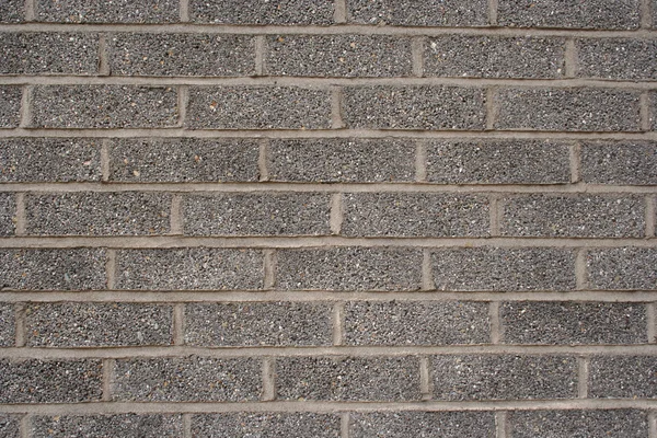 Grijze bakstenen muur — Stockfoto
