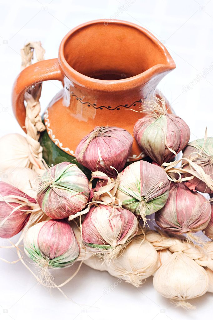 A jug and garlic