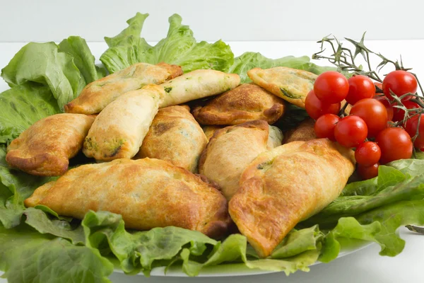 Italienska panzerotti med ingredienser Stockbild