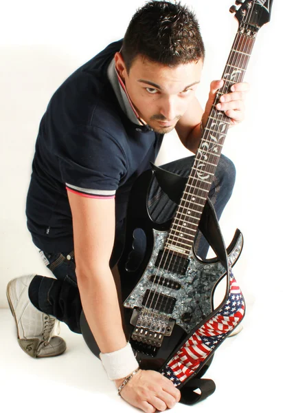 Guitarist on a white background — Stock Photo, Image