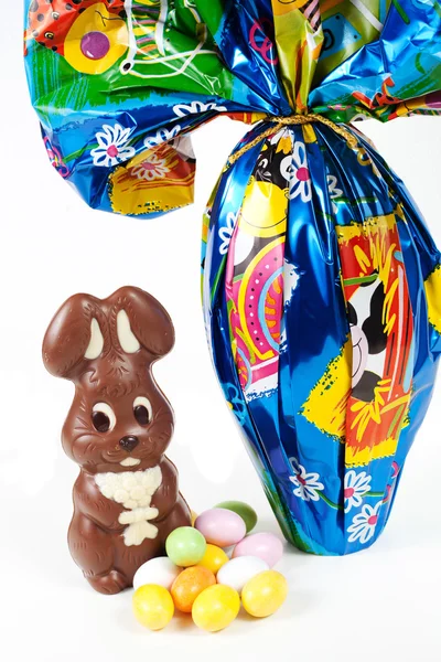 Easter bunny made of chocolate with easter egg — Stock Photo, Image