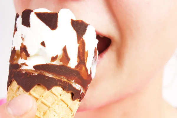 Girl eating icecream — Stock Photo, Image