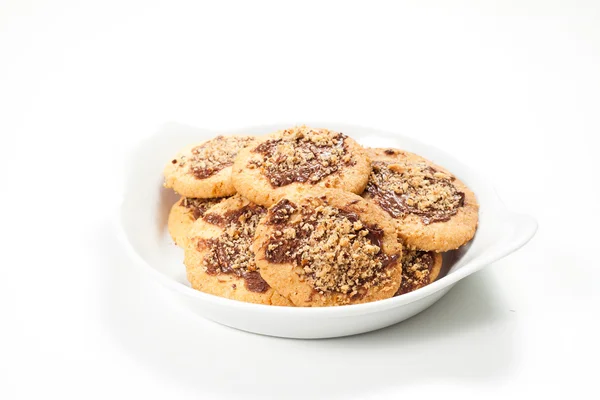 Hazelnoot en chocolade koekjes en cake — Stockfoto