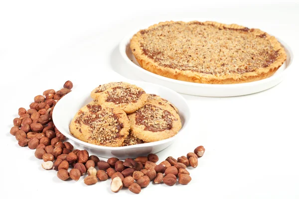 Hazelnut and chocolate cookies and cake — Stock Photo, Image