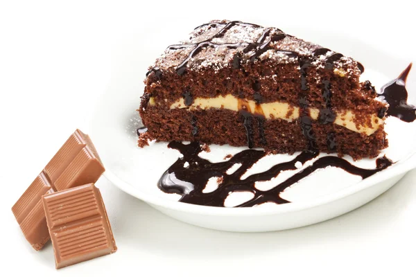 Piece of chocolate cake on plate — Stock Photo, Image