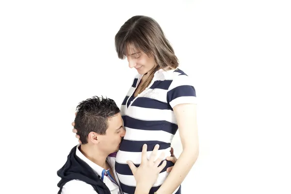 Jongen en meisje zwanger op een witte achtergrond — Stockfoto