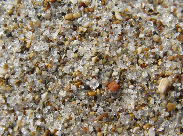 Gekleurd zand op een strand — Stockfoto
