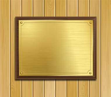 ahşap panel arka plan üzerinde pirinç plak