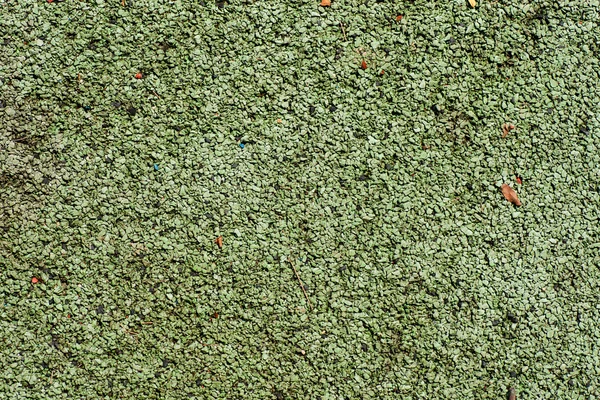 Parque infantil verde superfície de borracha macia — Fotografia de Stock