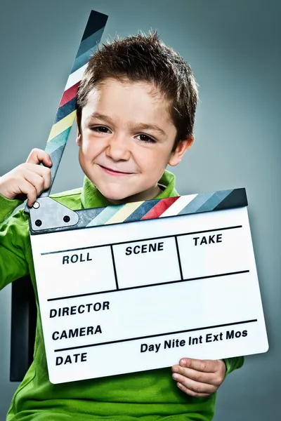 Kis színész lappal a fejét Stock Kép