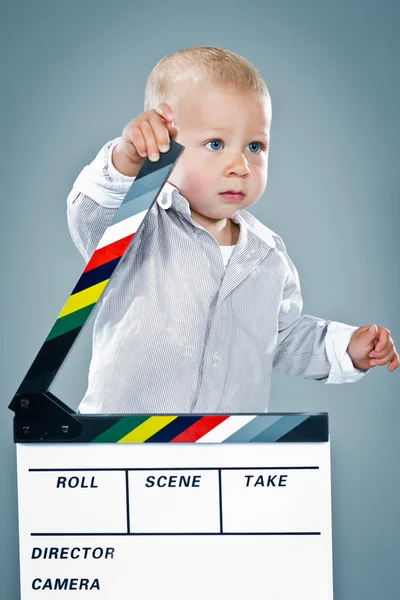 Cute Baby a Cinema Slate — Stock Photo, Image