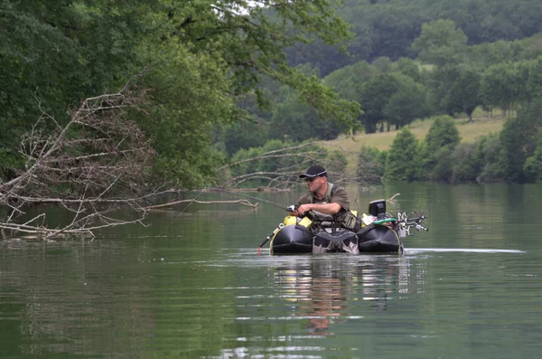 Fishing with a float tube — Stock Photo, Image