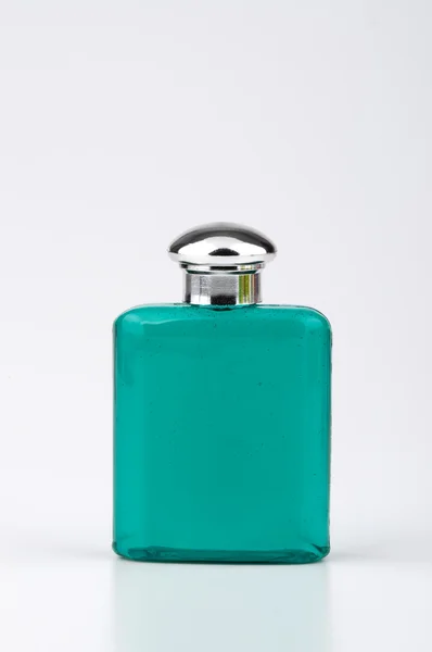 Turquoise green bottle of shampoo — Stock Photo, Image