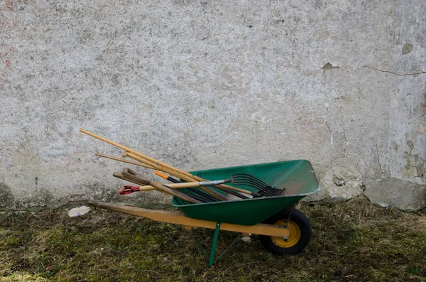 Tools in a wheelbarrow — Stock Photo, Image