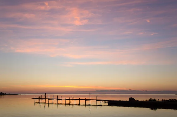 Kvällen ljus över Bad pier — Stockfoto