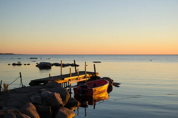 Sunlit old jetty — Stock Photo, Image