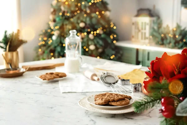 Christmas cookies on holiday decorated kitchen. New year background Stock Photo