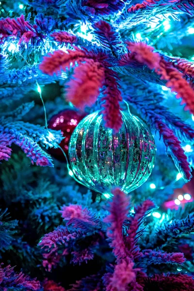 Christmas tree decorated with ball, background blur with led lights, bokeh — Stock Photo, Image