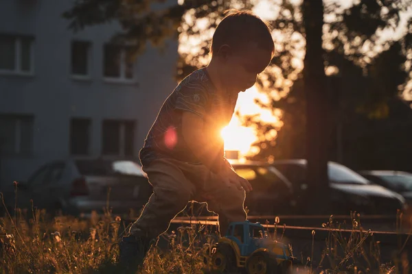 Child Playing Toys Little Boy Having Fun Playground Sunset Outdoor —  Fotos de Stock